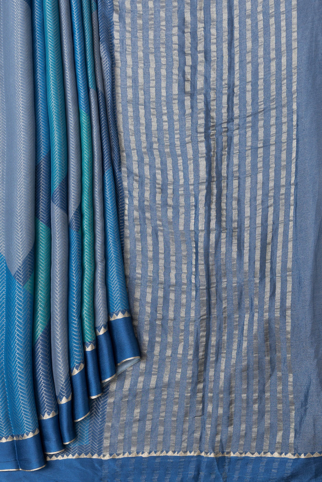 Pleats and pallu of Navy Blue and Sky Blue Color Mysore Georgette Saree with Zari Brocade on the body and Zari Border. 