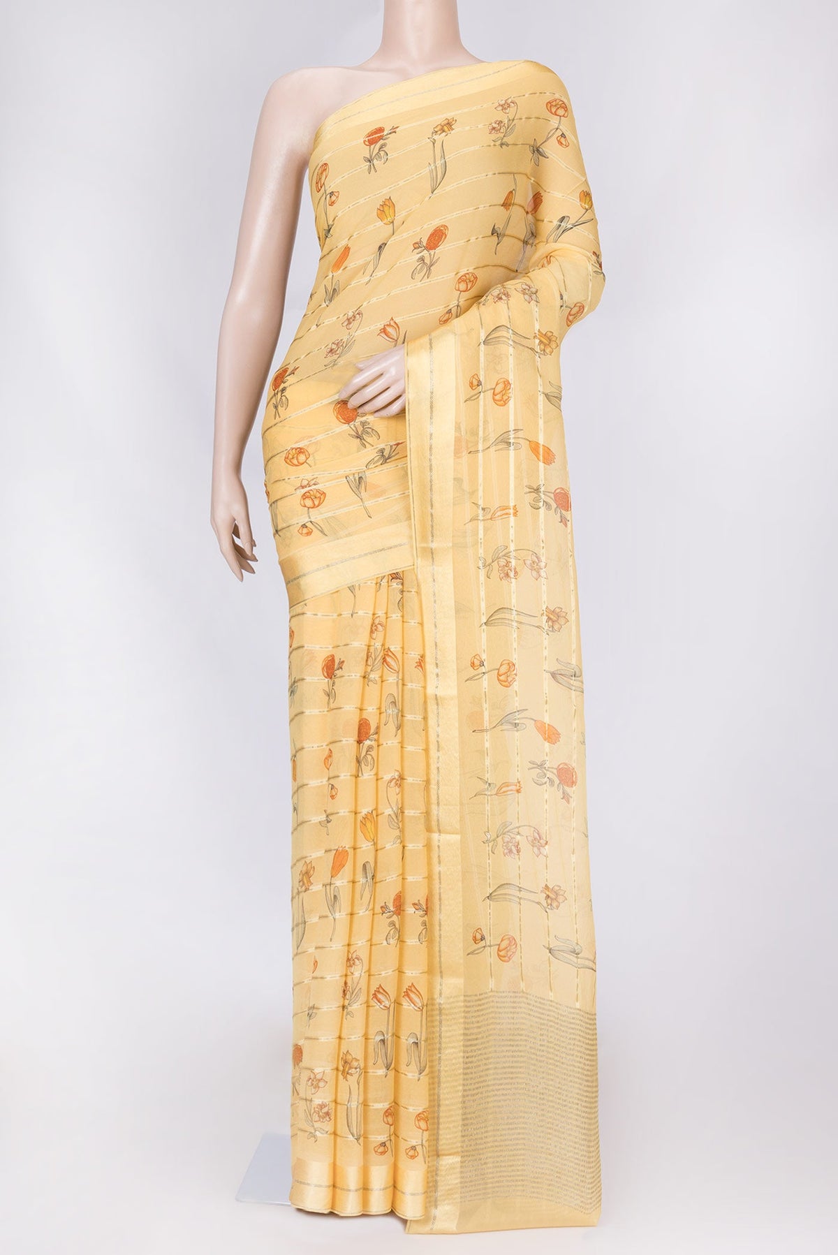 Yellow Dual Tone Mysore Chiffon Saree with Printed design on the body and Zari Border displayed on a mannequin
