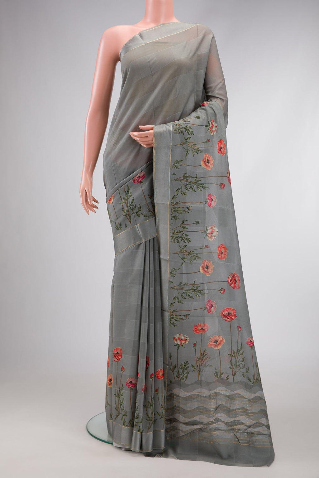 Grey Dual Tone Mysore Crepe Saree with Printed design on the body and Fancy Border.  displayed on a mannequin