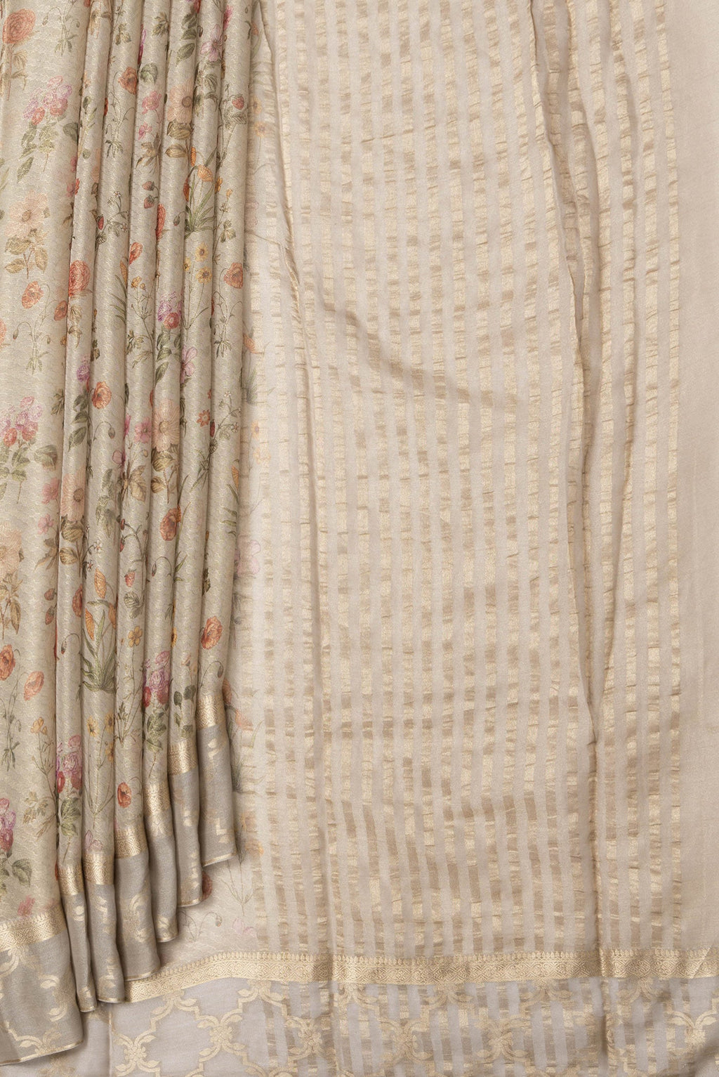 Pleats and pallu of Beige Dual Tone Mysore Georgette Saree with Printed design on the body and Fancy Border. 