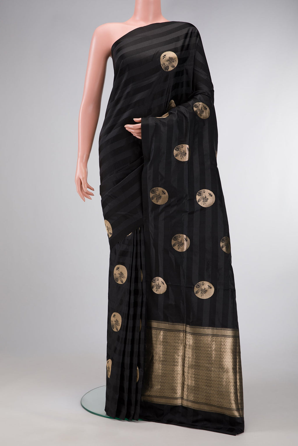 Black Dual Tone Banarasi Silk Saree with Zari Butta on the body and Without Border.  displayed on a mannequin
