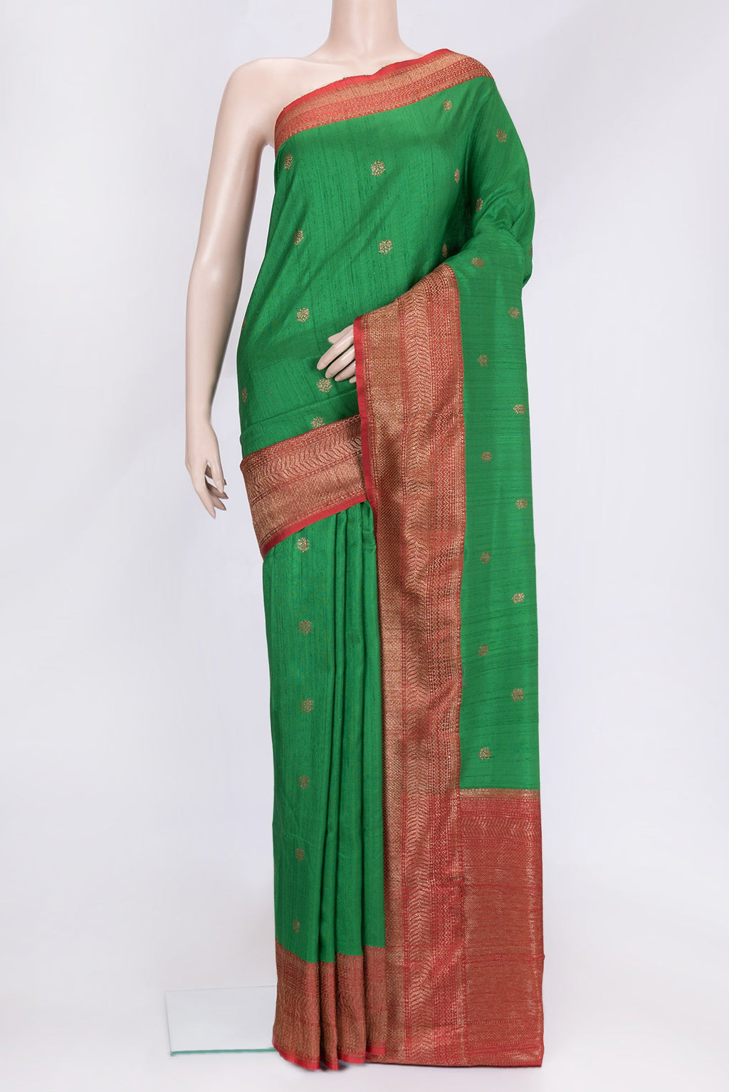 Green Dual Tone Raw Silk Saree with Zari Butta on the body and Zari Border.  displayed on a mannequin