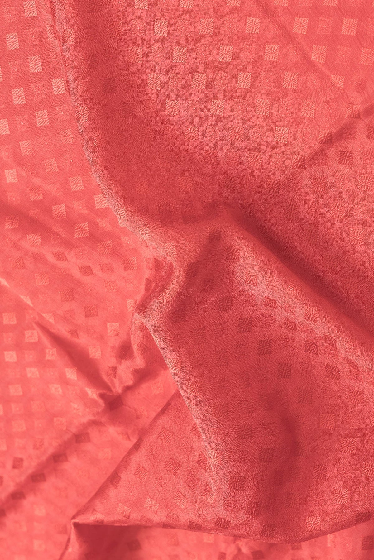 Close up of Pink Dual Tone Mysore Georgette Saree with Jacquard design on the body and Zari Border.  displaying folds