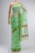 Green Kota Silk Saree with Zari And Thread Butta on the body and Zari Border displayed on a mannequin