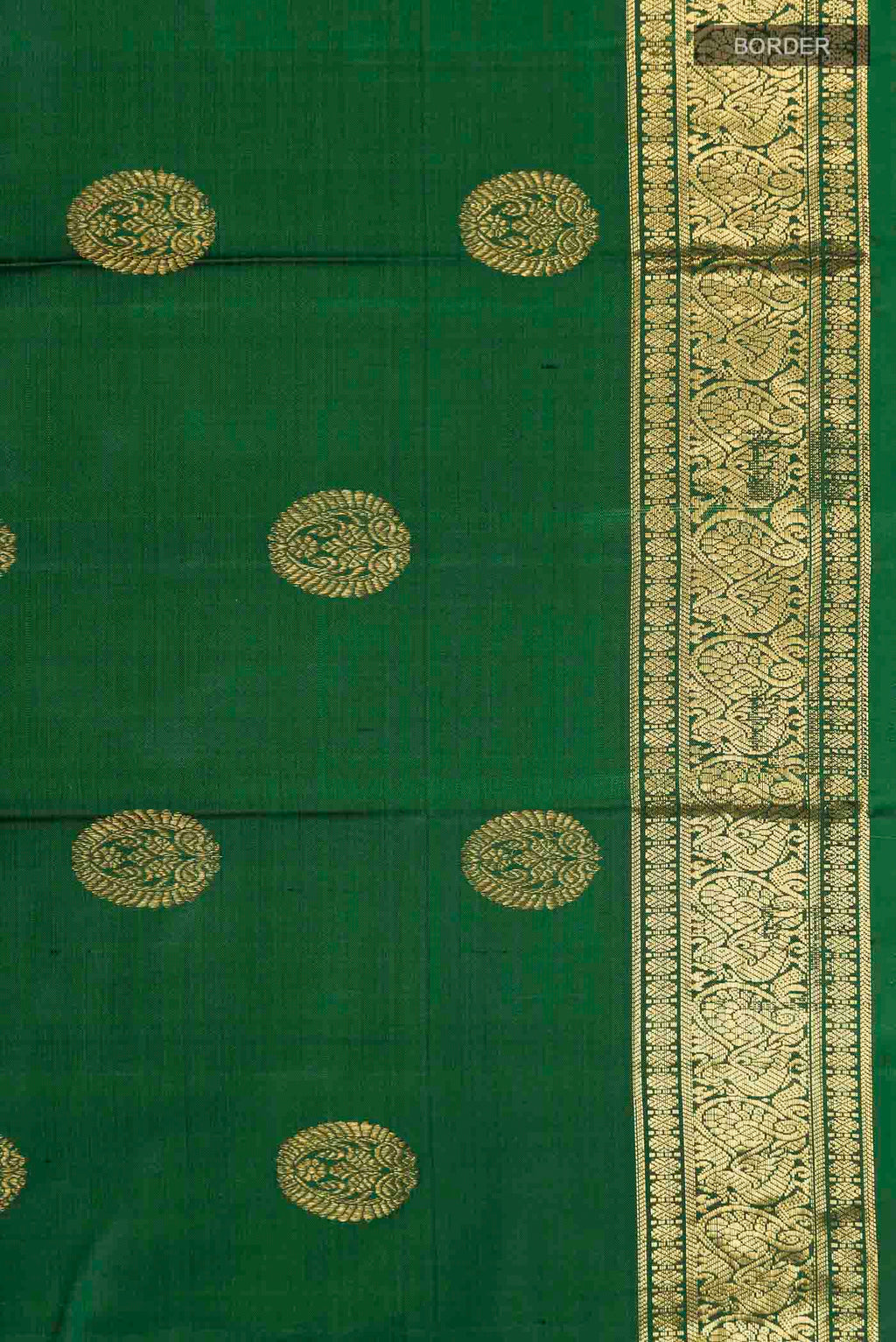 Border image of Green Kanchipuram Silk Saree with Zari Butta on the body and Zari Border