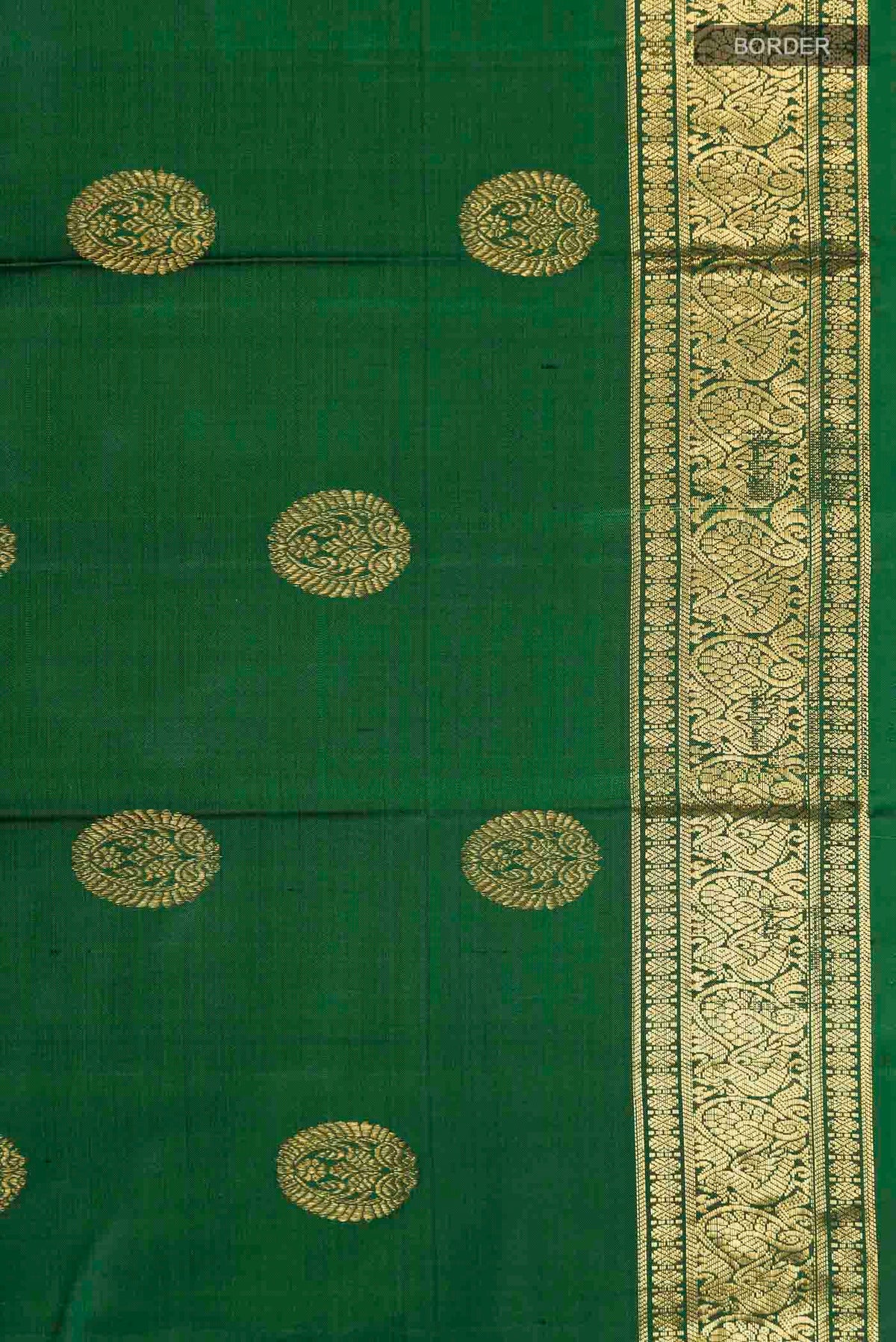 Border image of Green Kanchipuram Silk Saree with Zari Butta on the body and Zari Border