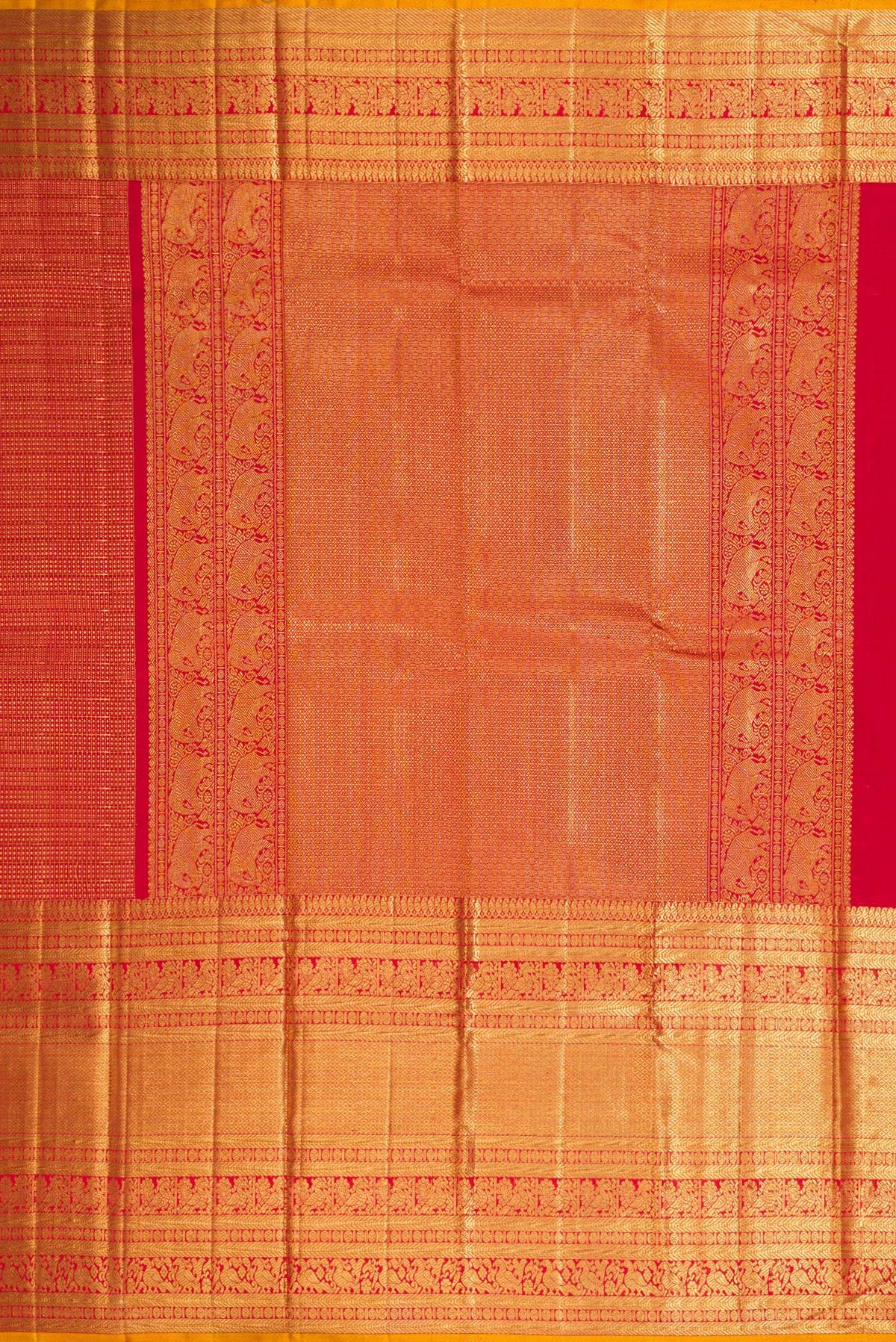 Close up image of the pallu of Maroon Dual Tone Kanchipuram Silk Saree with Zari Brocade on the body and Zari Border. 