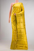 Green Dual Tone Kanchipuram Tissue Silk Saree with Zari Brocade on the body and Zari Border.  displayed on a mannequin