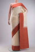 Cream Kanchipuram Silk Saree with Plain Body and Temple Border displayed on a mannequin