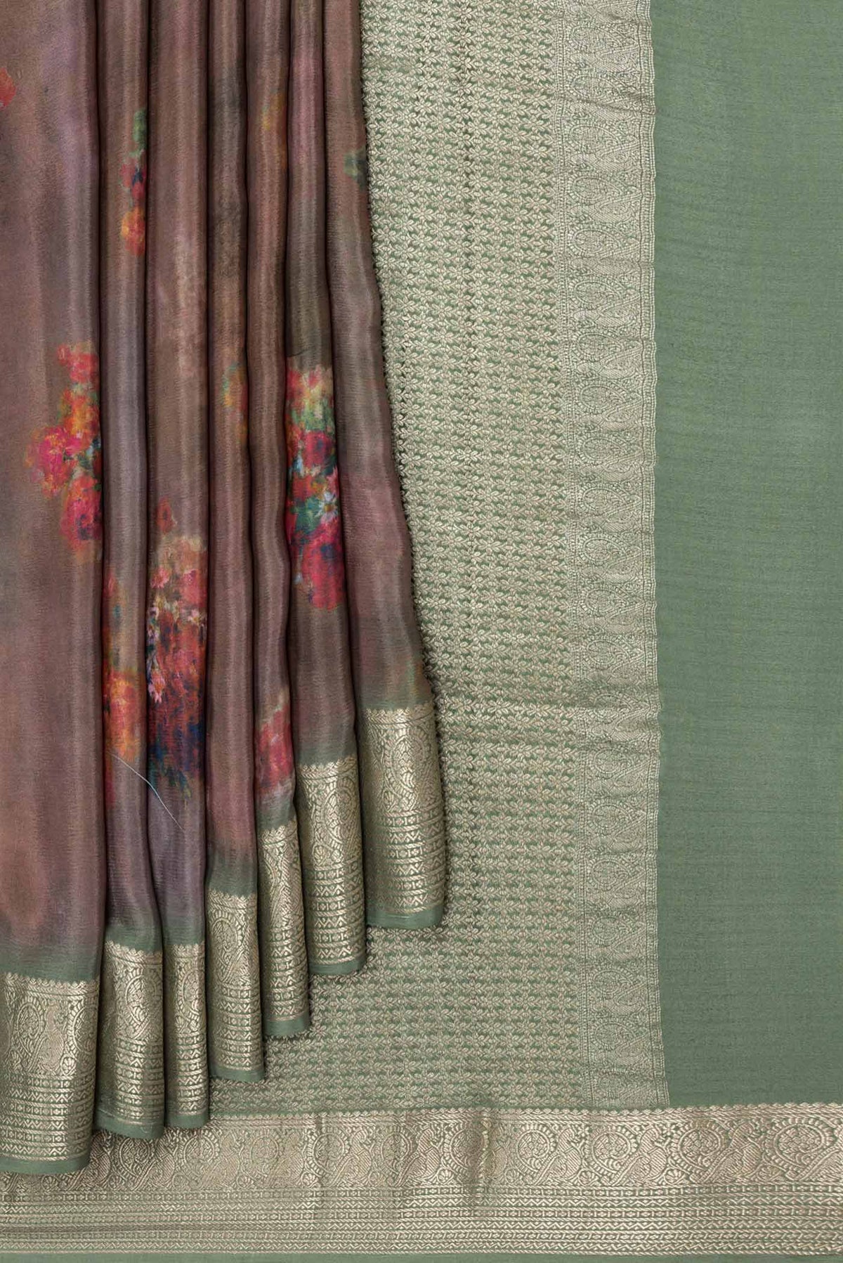 Pleats and pallu of Brown Mysore Crepe Saree with Floral Print on the body and Zari Border