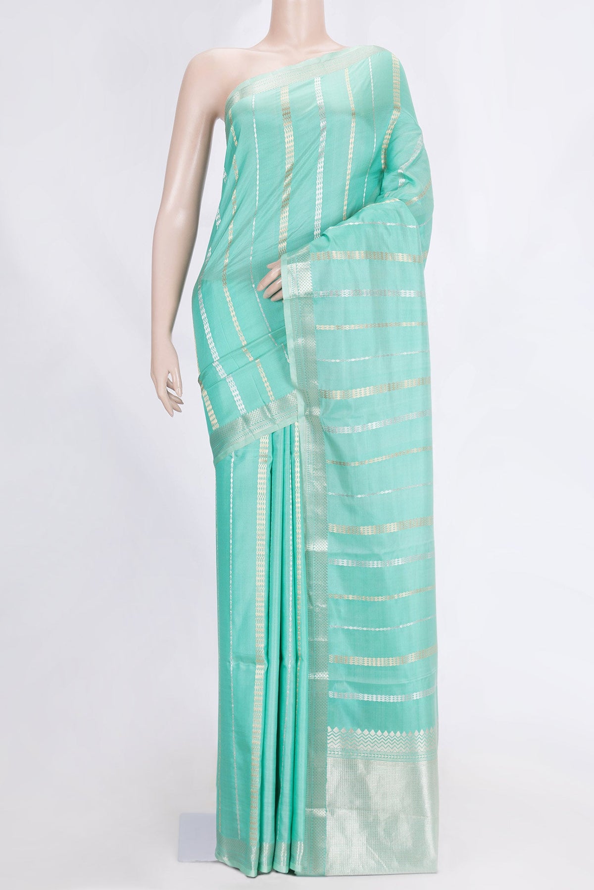 Sea Green Dual Tone Banarasi Silk Saree with Stripes on the body and Zari Border.  displayed on a mannequin