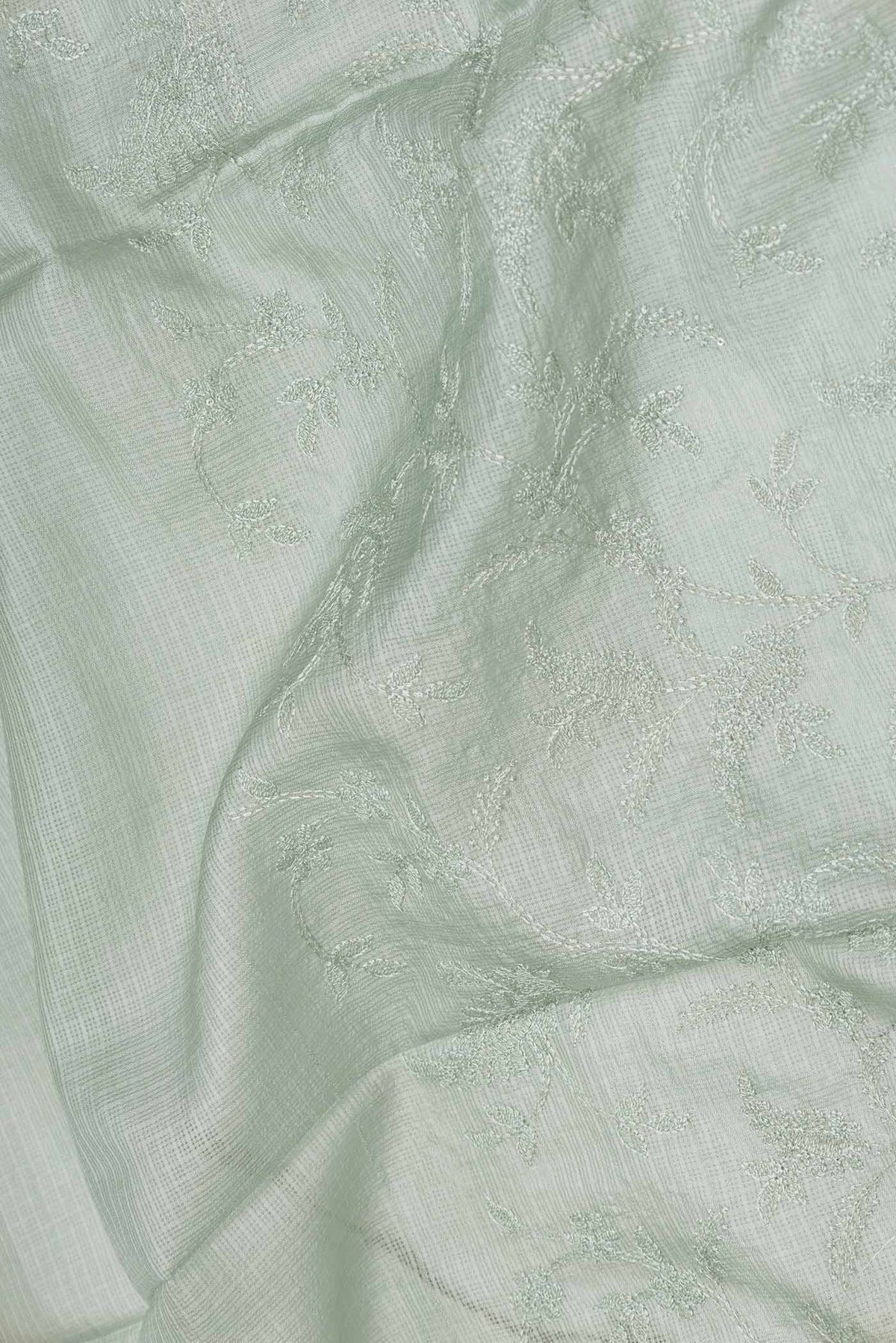 Close up of Light Green Dual Tone Kota Silk Saree with Embroidery on the body and Embroidery Border displaying folds