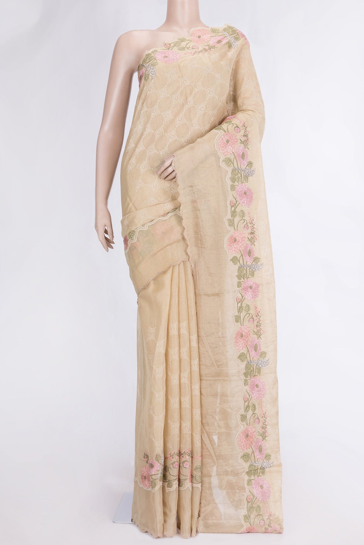 Beige Dual Tone Organza Silk Saree with Embroidery on the body and Embroidery Border.  displayed on a mannequin