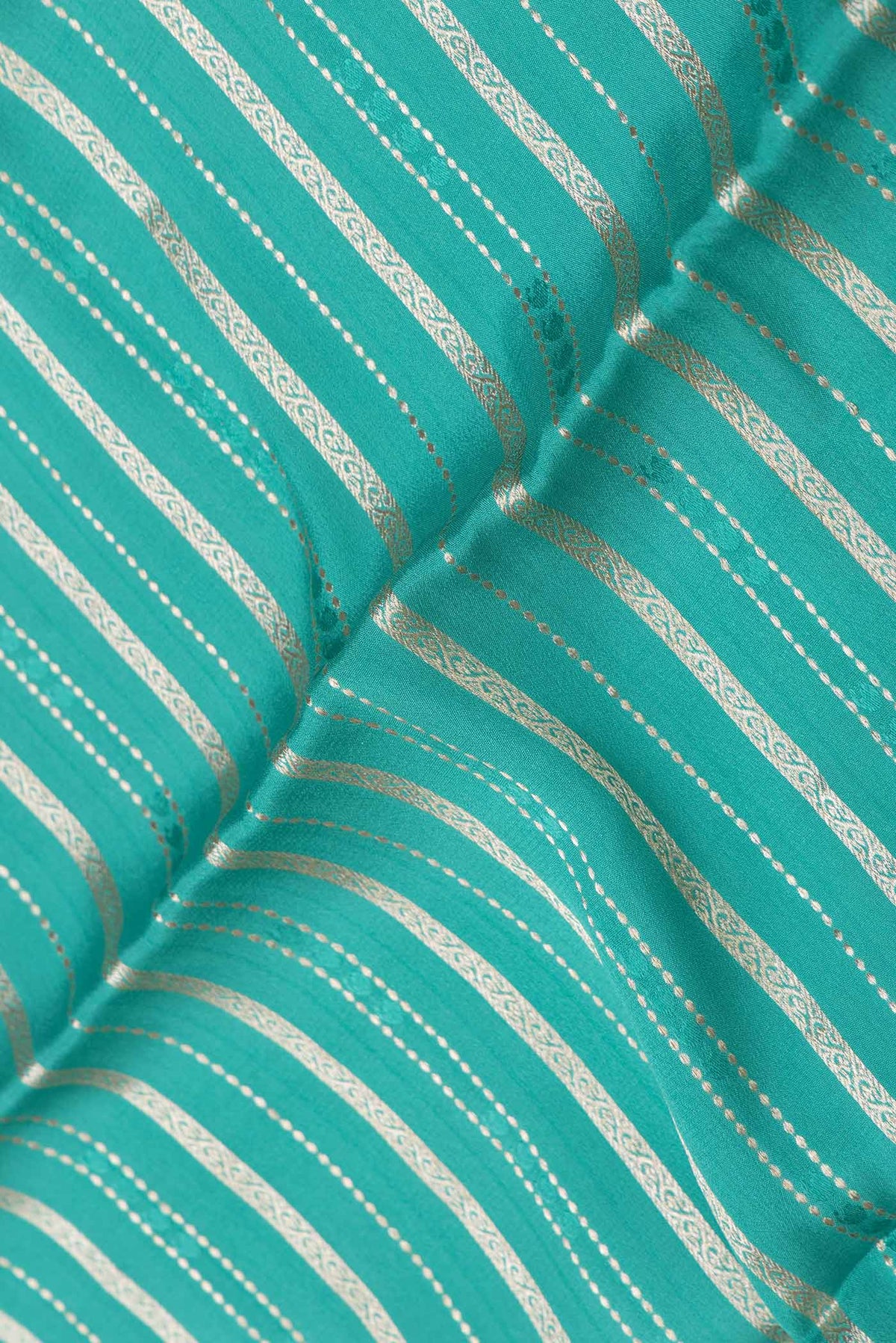 Close up of Sea Green Dual Tone Mysore Georgette Saree with Stripes on the body and Zari Border displaying folds