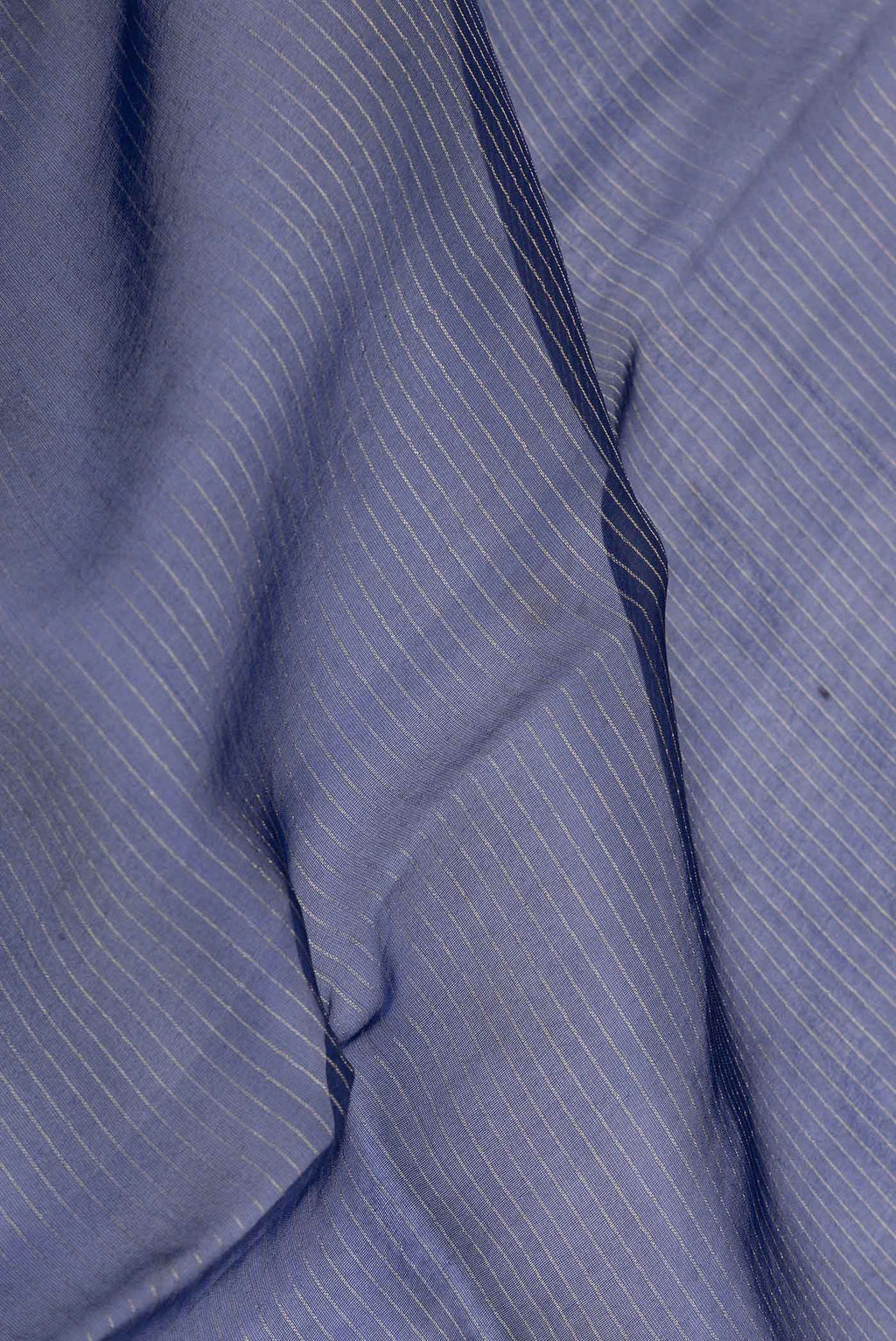 Close up of Navy Blue Dual Tone Organza Silk Saree with Stripes on the body and Embroidery Border displaying folds