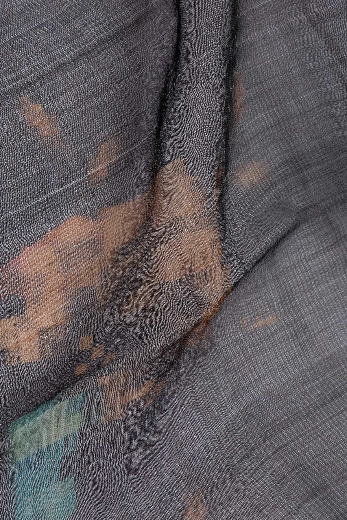 Close up of Black Dual Tone Tussar Silk Saree with Stripes on the body and Plain Border.  displaying folds