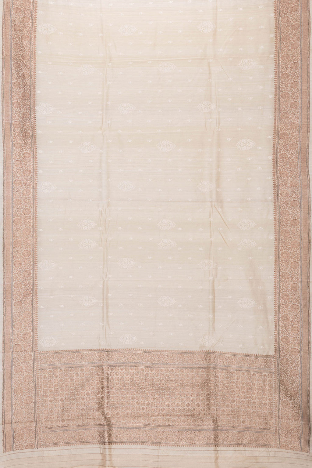Flat view of Beige Dual Tone Tussar Silk Saree with Embroidery on the body and Zari Border. 