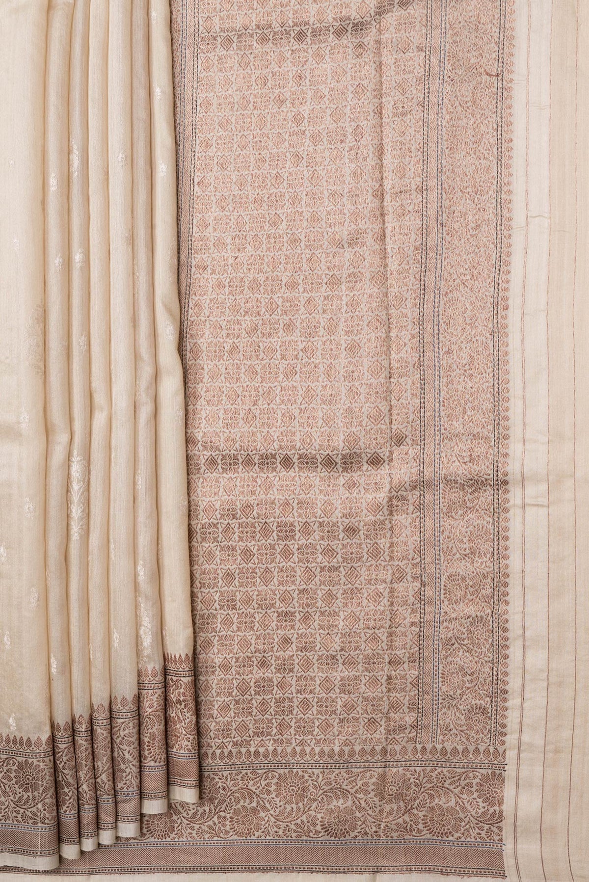 Pleats and pallu of Beige Dual Tone Tussar Silk Saree with Embroidery on the body and Zari Border. 