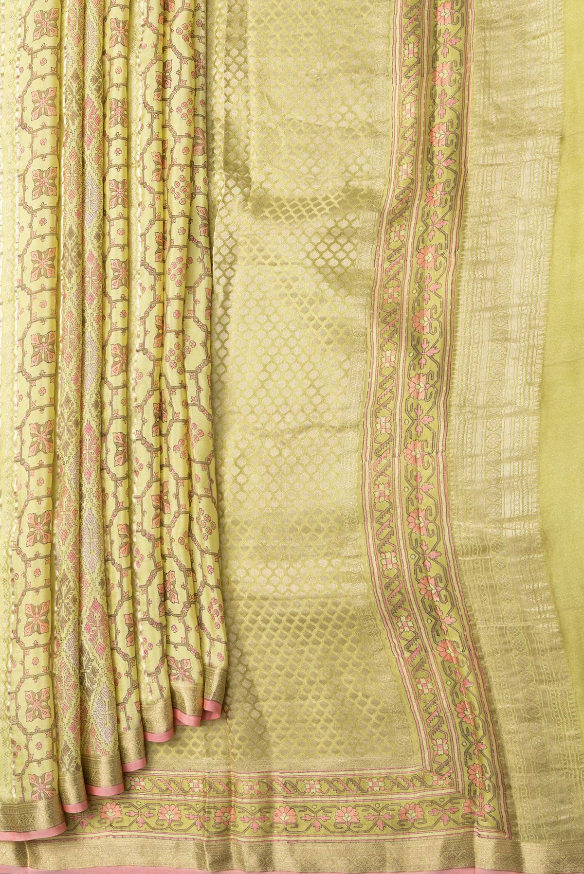 Pleats and pallu of Lemon Yellow Dual Tone Mysore Crepe Saree with Printed design on the body and Zari Border. 