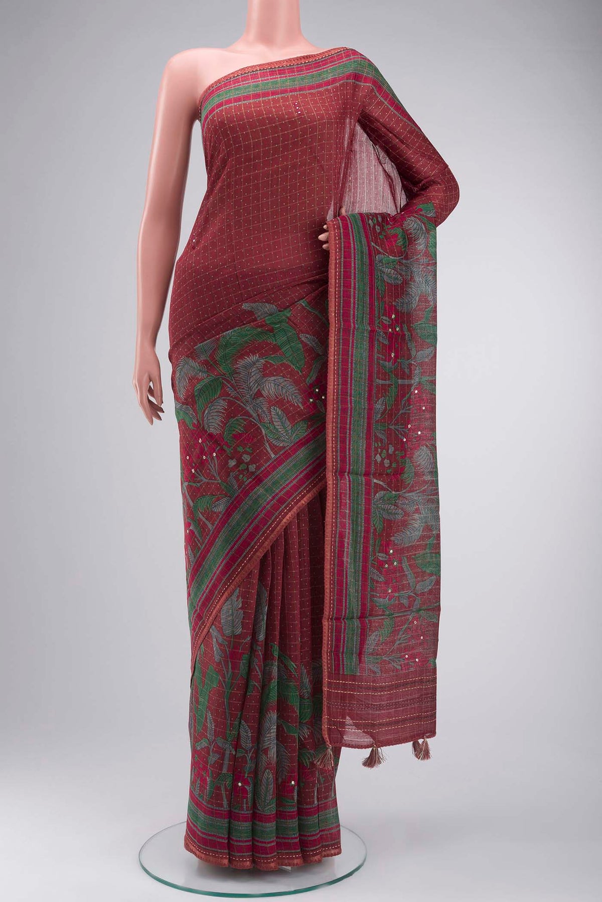 Maroon Bhagalpuri Tussar Silk Saree with Printed design on the body and Embroidery Border displayed on a mannequin