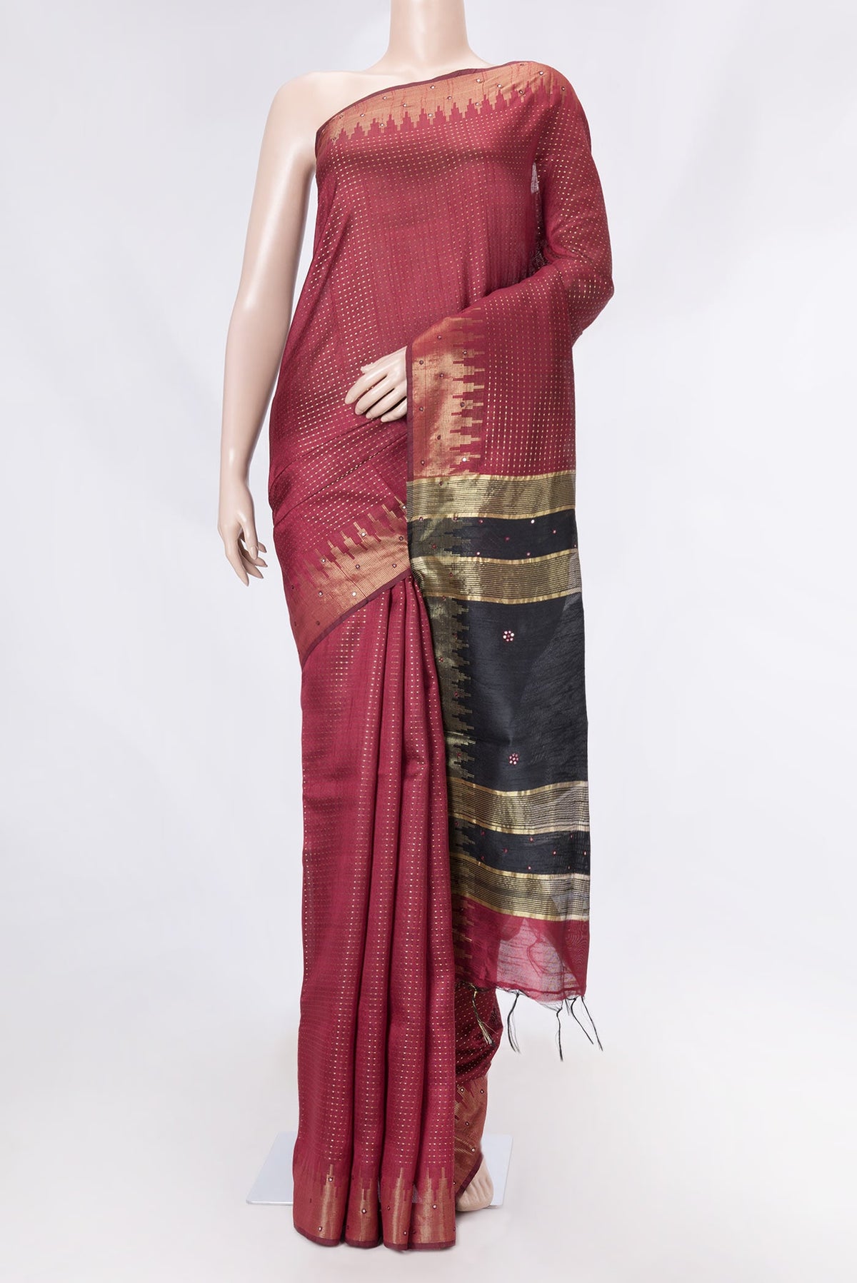 Maroon Dual Tone Tussar Saree with Stripes on the body and Embroidery Border displayed on a mannequin