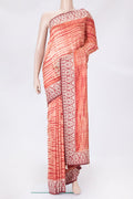 Golden Peach Dual Tone Tussar Silk Saree with Printed design on the body and Embroidery Border.  displayed on a mannequin