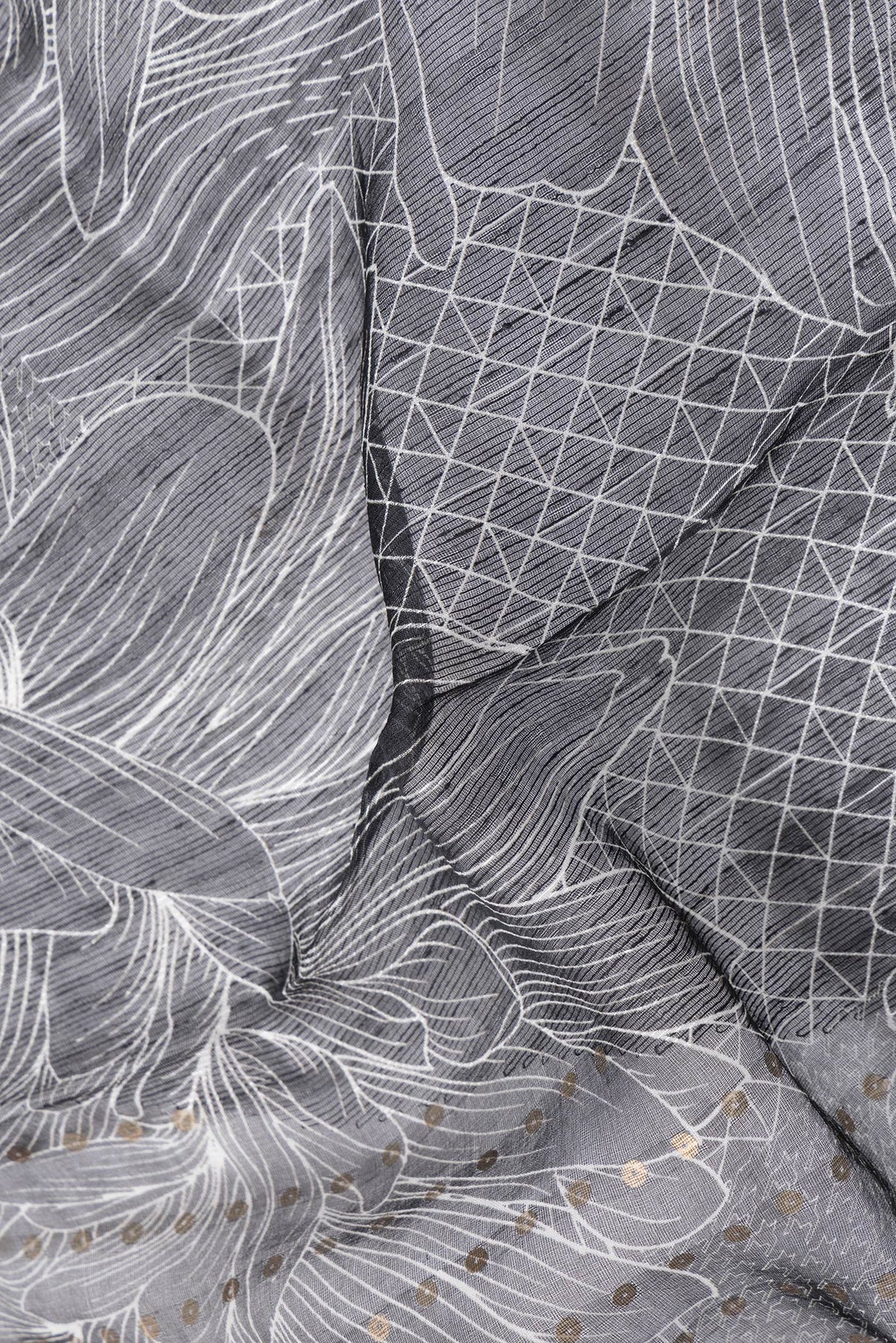 Close up of Black Dual Tone Tussar Silk Saree with Printed design on the body and Without Border.  displaying folds