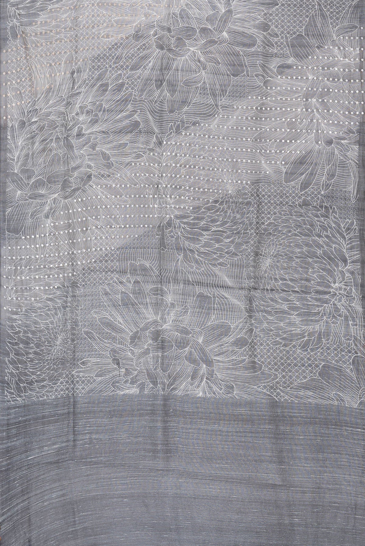 Flat view of Black Dual Tone Tussar Silk Saree with Printed design on the body and Without Border. 