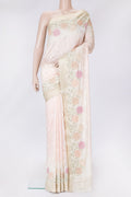 Rose Gold Dual Tone Tussar Silk Saree with Embroidery on the body and Zari Border.  displayed on a mannequin