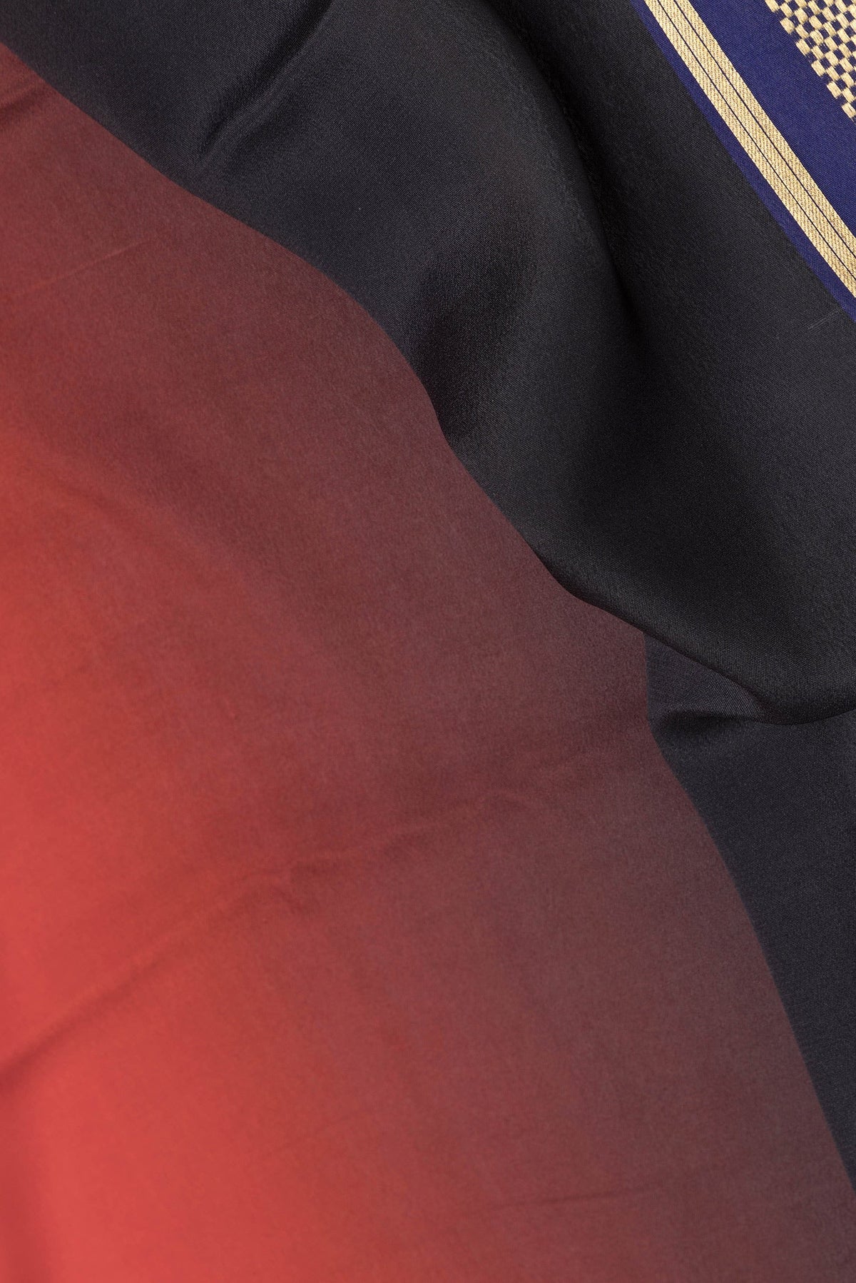Close up of Multi Color Mysore Silk Saree with Plain Body and Zari Border.  displaying folds