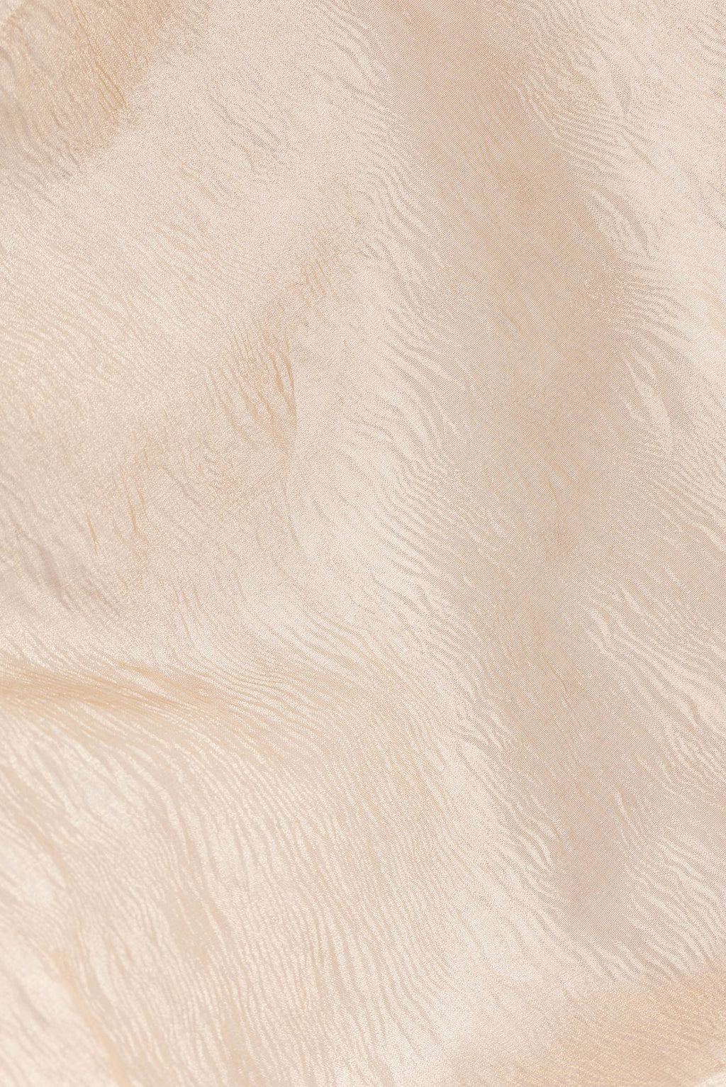Close up of Gold Dual Tone Organza Silk Saree with Plain Body and Embroidery Border.  displaying folds
