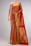 Pure Silk Pure Zari Red Dual Tone Kanjivaram Saree with Zari Brocade on the body and Zari Border.  displayed on a mannequin