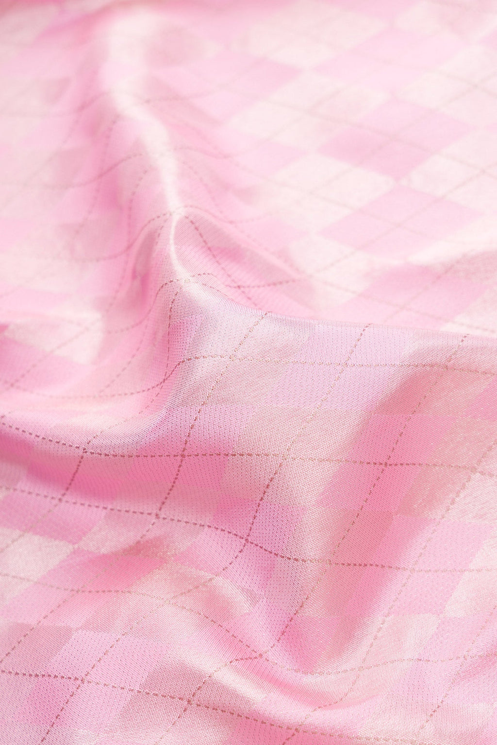 Close up of Rose pink Dual Tone Kanjivaram Silk Saree with Zari Brocade on the body and Fancy Border.  displaying folds