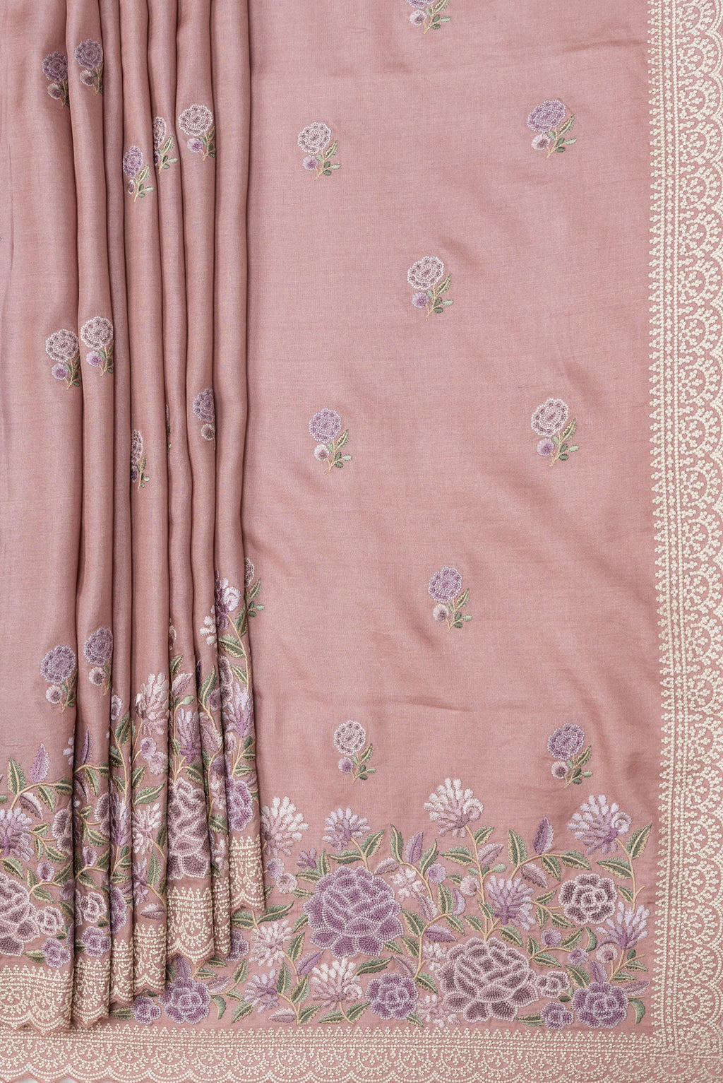 Pleats and pallu of Rose Gold Dual Tone Tussar Silk Saree with Embroidery on the body and Embroidery Border. 
