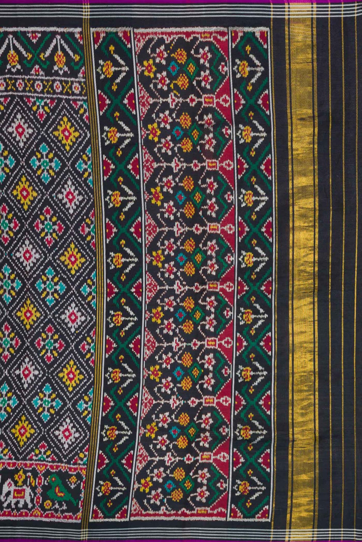 Close up image of the pallu of Black Pochampally Silk Saree with Pure Ikat on the body and Plain Border
