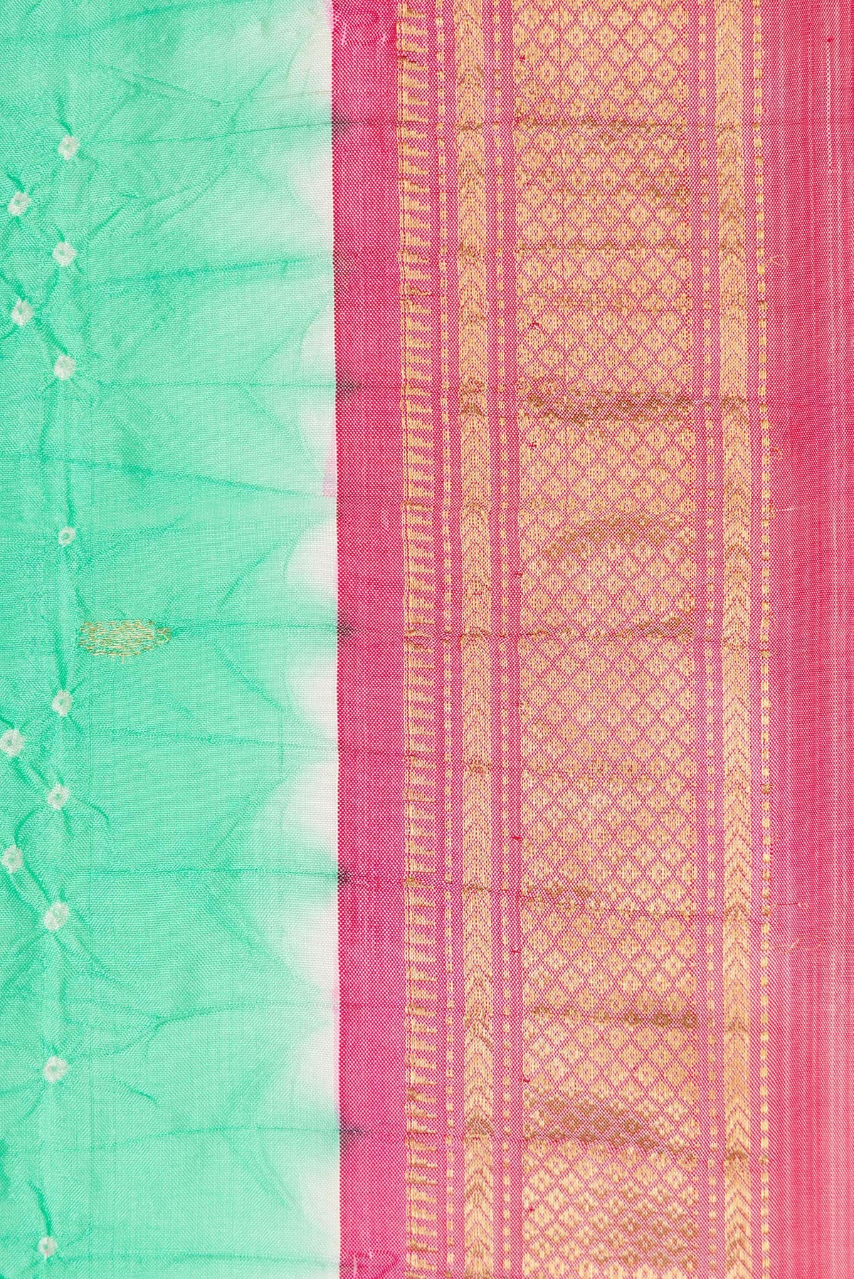 Border image of Sea Green Dual Tone Bandhani Silk Saree with Bandhani Print on the body and Zari Border. 