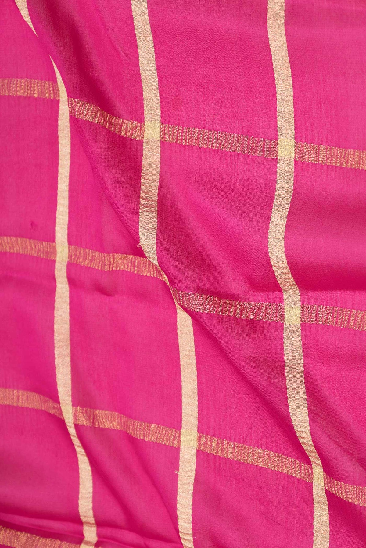 Close up of Pink Dual Tone Mysore Crepe Saree with Checked design on the body and Zari Border displaying folds