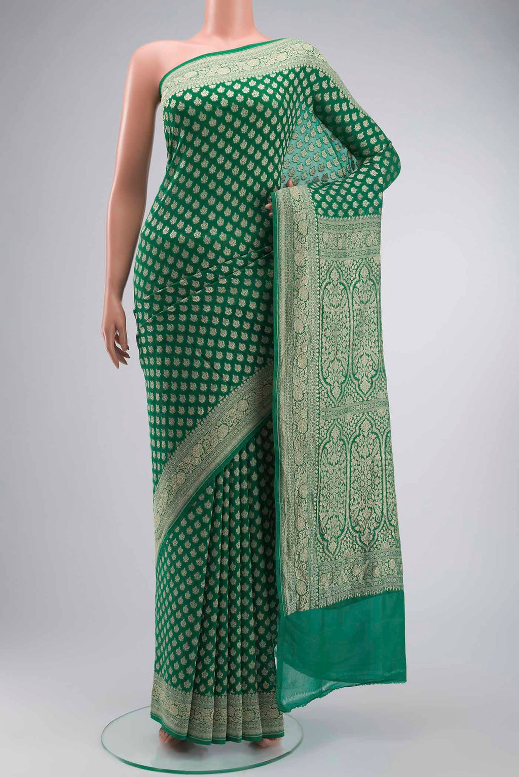 Green Banarasi Georgette Saree with Zari Butta on the body and Zari Border displayed on a mannequin