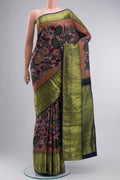 Mauve Kanchipuram Silk Saree with kalamkari Print on the body and Zari Border displayed on a mannequin