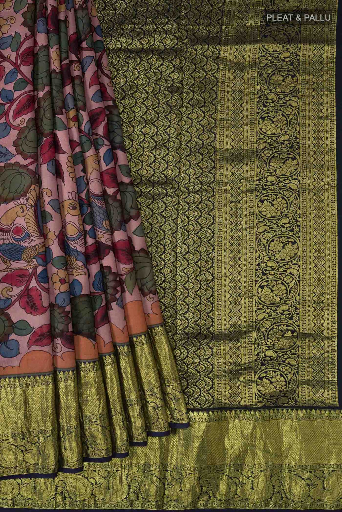 Pleats and pallu of Mauve Kanchipuram Silk Saree with kalamkari Print on the body and Zari Border