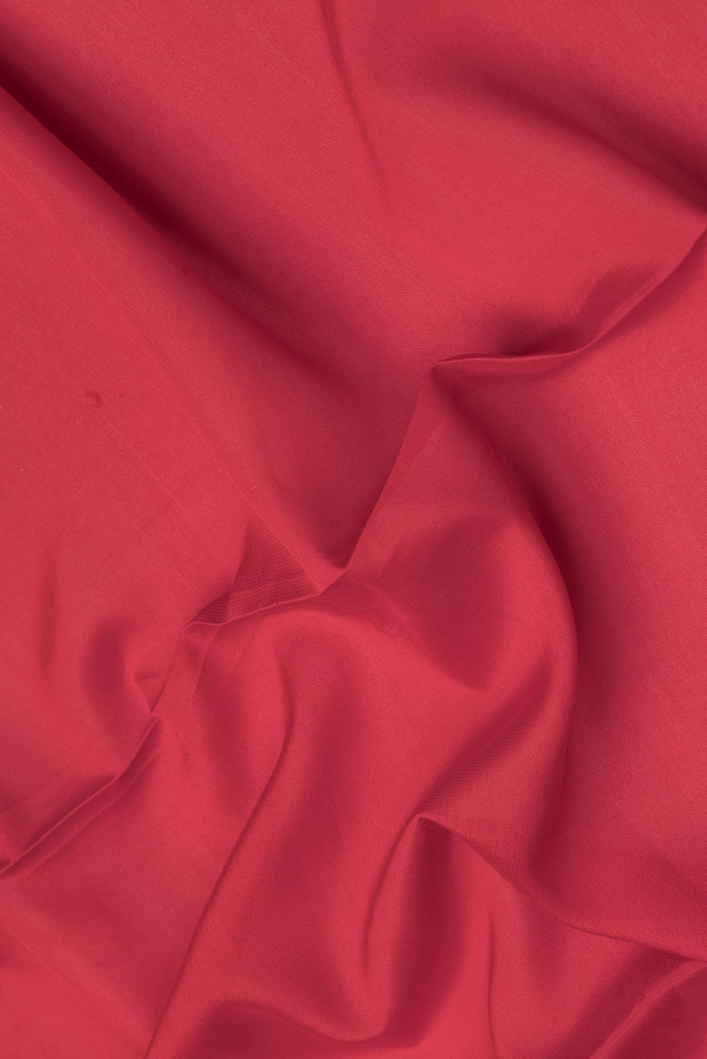 Close up of Red Dual Tone Mysore Silk Saree with Plain Body and Zari Border.  displaying folds
