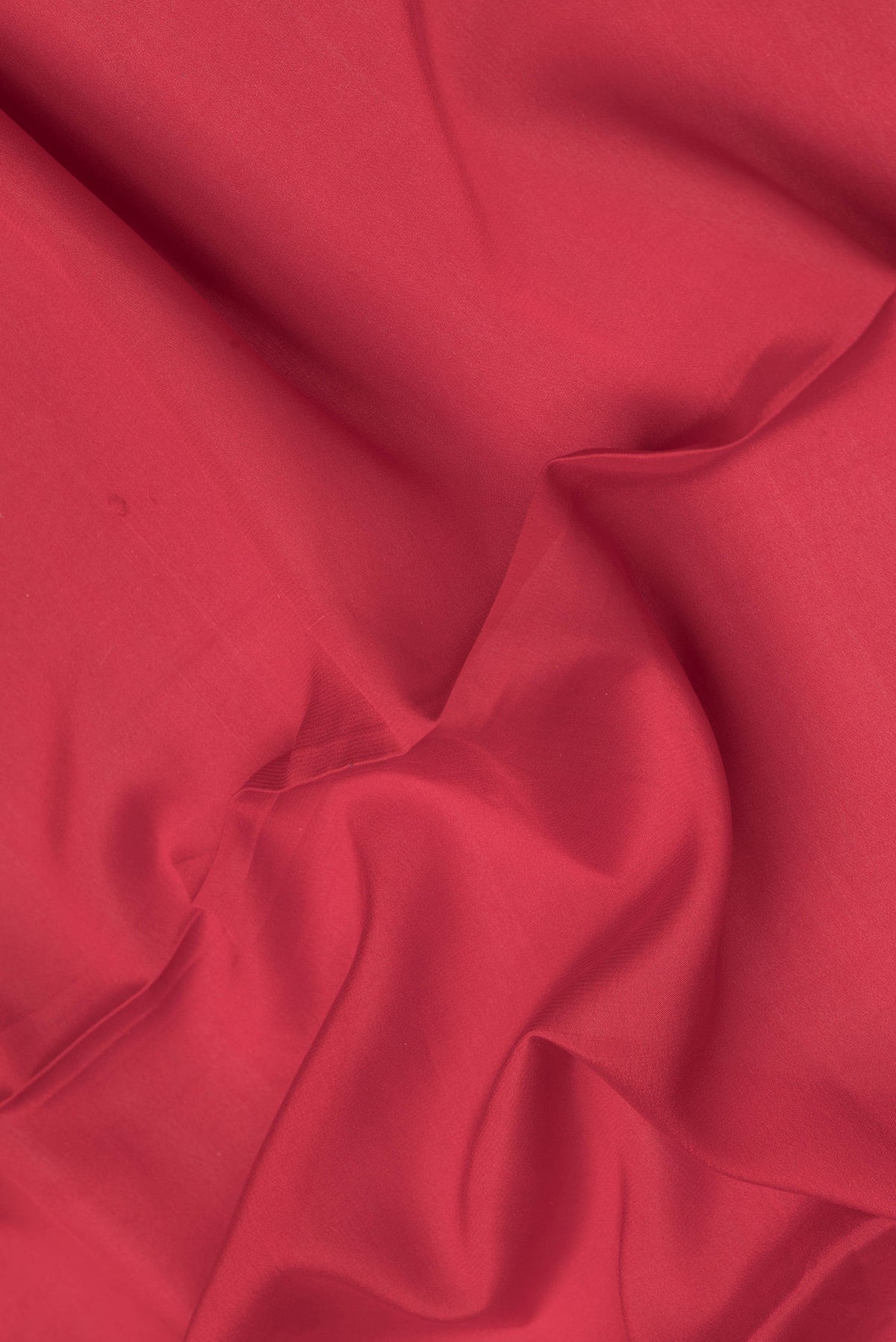 Close up of Red Dual Tone Mysore Silk Saree with Plain Body and Zari Border.  displaying folds