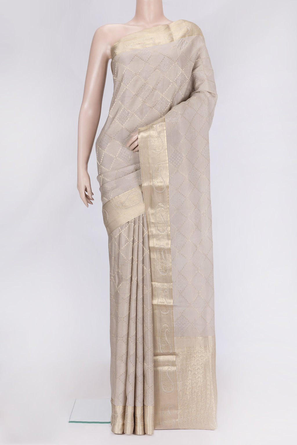 Beige Dual Tone Mysore Georgette Saree with Zari Brocade on the body and Zari Border.  displayed on a mannequin