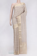 Beige Dual Tone Mysore Georgette Saree with Zari Brocade on the body and Zari Border.  displayed on a mannequin