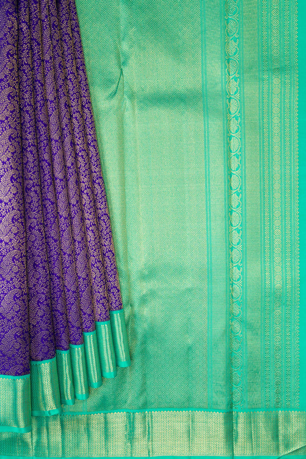 Pleats and pallu of Pure Silk Pure Zari Royal Blue Dual Tone Kanjivaram Saree with Zari Brocade on the body and Zari Border. 