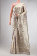 Lavender Dual Tone Kanchipuram Tissue Silk Saree with Zari Brocade on the body and Zari Border displayed on a mannequin