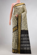 Sandal Pochampally Silk Saree with Pure Ikat on the body and Zari Border displayed on a mannequin
