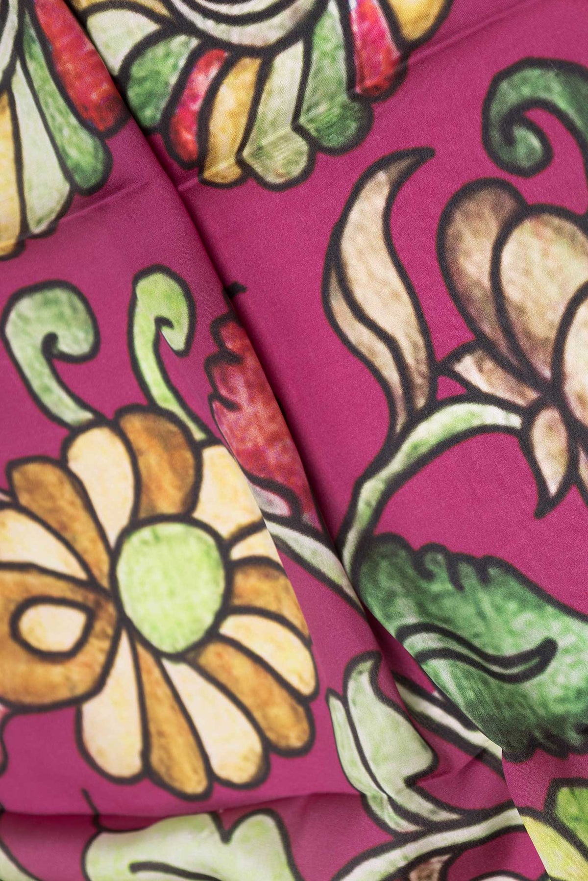 Close up of Pink Dual Tone Mysore Crepe Saree with Printed design on the body and Zari Border displaying folds