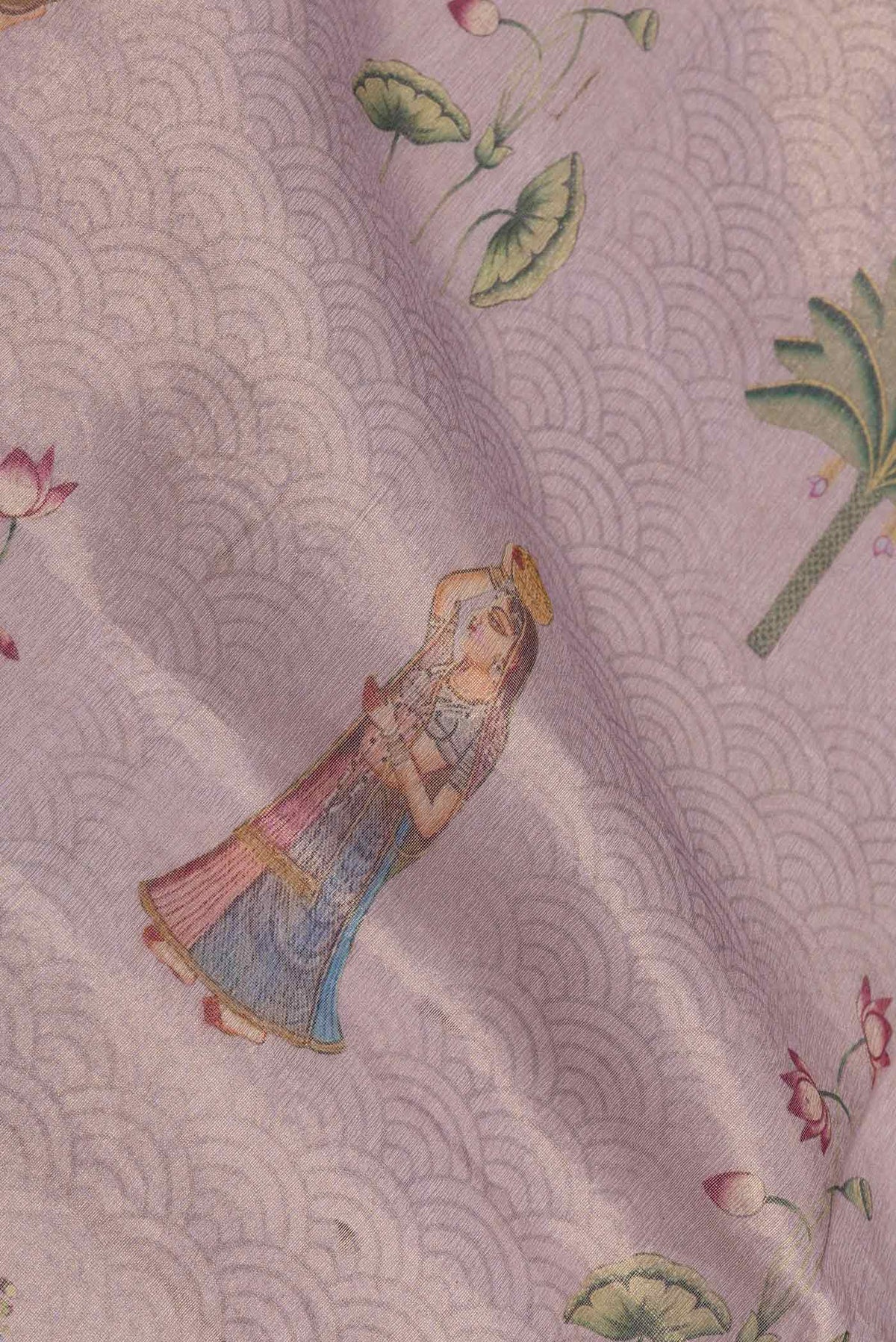Close up of Lavender Dual Tone Organza Silk Saree with Zari Brocade on the body and Zari Border displaying folds