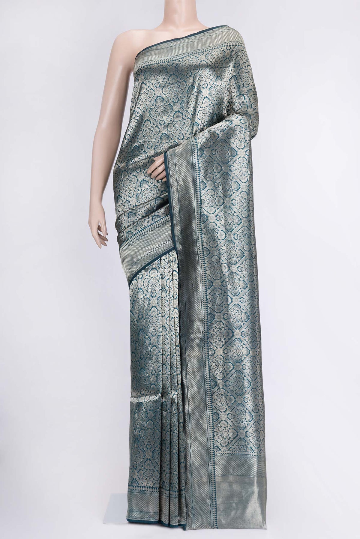 Peacock Blue Dual Tone Banarasi Silk Saree with Zari Brocade on the body and Zari Border.  displayed on a mannequin